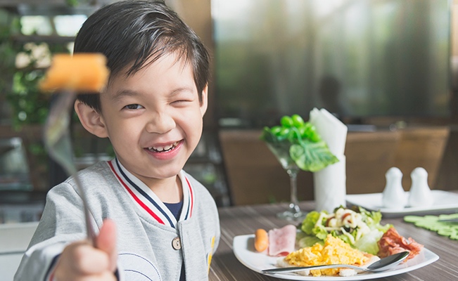 Child eating healthy food